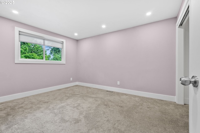 16880 Cortez Ct, Lake Oswego, OR 97035 - carpeted empty room with baseboards and recessed lighting