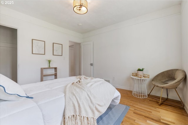 1235 N Farragut St, Portland, OR 97217 - bedroom featuring light wood-style flooring and baseboards