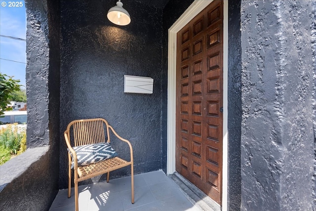 1235 N Farragut St, Portland, OR 97217 - doorway to property featuring stucco siding