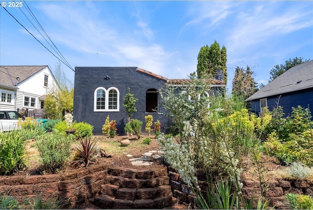 1235 N Farragut St, Portland, OR 97217 - view of front of property featuring stucco siding