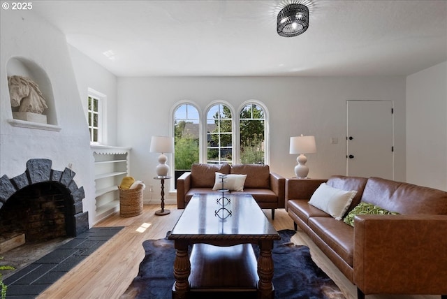 1235 N Farragut St, Portland, OR 97217 - living room with wood finished floors and a fireplace with flush hearth