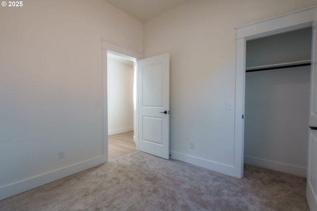 535 E St, Independence, OR 97351 - unfurnished bedroom featuring carpet, a closet, and baseboards