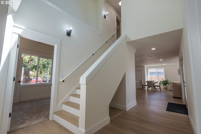 535 E St, Independence, OR 97351 - stairway featuring recessed lighting, baseboards, and wood finished floors