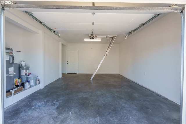535 E St, Independence, OR 97351 - garage featuring strapped water heater