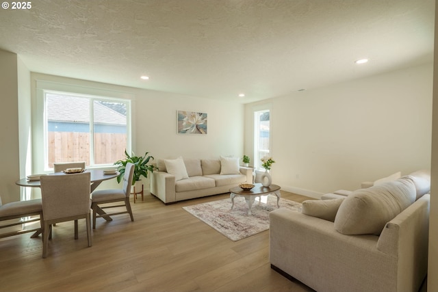 535 E St, Independence, OR 97351 - living room with light wood-type flooring, plenty of natural light, and recessed lighting