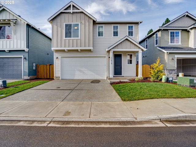 craftsman house featuring a garage and a front yard