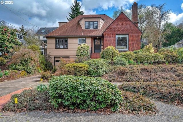 view of front of home with a chimney