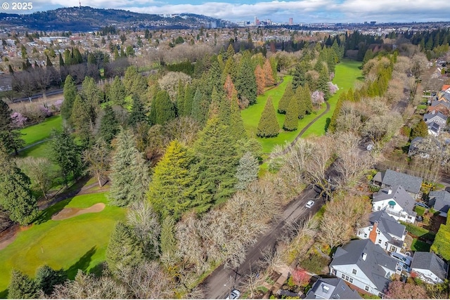 birds eye view of property featuring a mountain view and a residential view