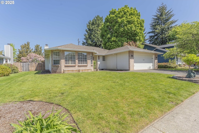 view of front facade featuring aphalt driveway, fence, a front yard, brick siding, and an attached garage