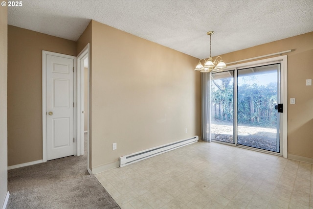 spare room featuring a notable chandelier, a baseboard radiator, and a textured ceiling