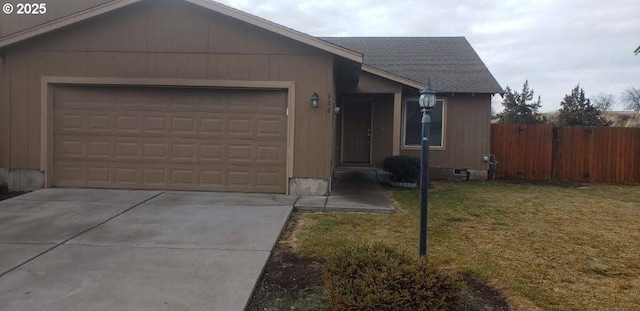 888 SE Kierra Pl, Madras, OR 97741 - view of front of house with an attached garage, a shingled roof, fence, driveway, and a front yard