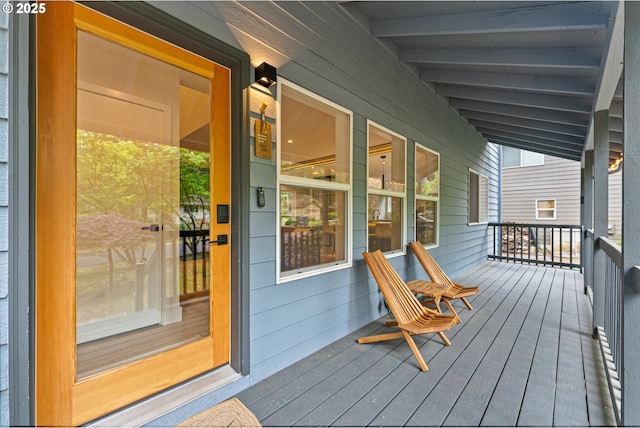 wooden terrace with covered porch