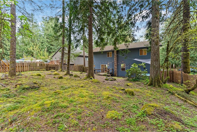view of yard with a fenced backyard