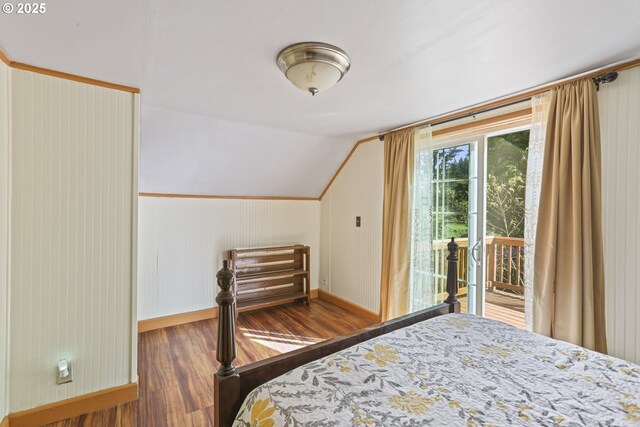 51557 SW Em Watts Rd, Scappoose, OR 97056 - bedroom featuring baseboards, access to outside, wood finished floors, and lofted ceiling