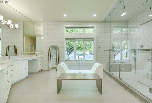 1564 Regency Dr, Eugene, OR 97401 - bathroom featuring double vanity, a soaking tub, a shower stall, tile patterned floors, and tile walls