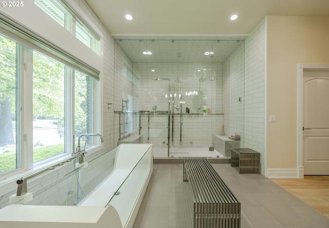 1564 Regency Dr, Eugene, OR 97401 - bathroom featuring recessed lighting, a tub to relax in, a shower stall, tile patterned floors, and baseboards