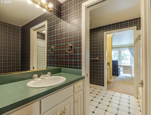 1564 Regency Dr, Eugene, OR 97401 - bathroom featuring vanity, tile patterned floors, wallpapered walls, and baseboards