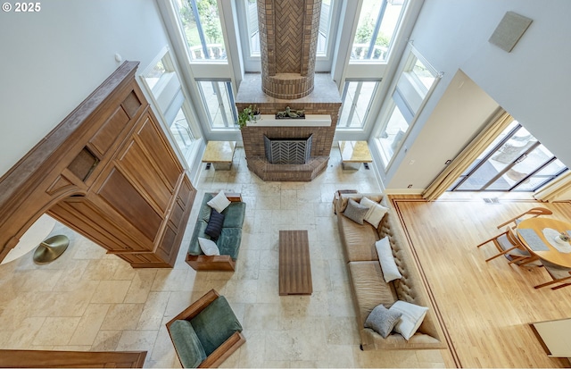 1564 Regency Dr, Eugene, OR 97401 - living area featuring a towering ceiling and a fireplace