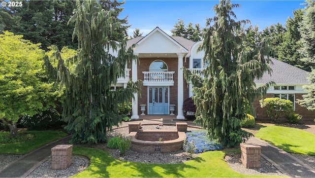 1564 Regency Dr, Eugene, OR 97401 - greek revival inspired property featuring brick siding and a balcony
