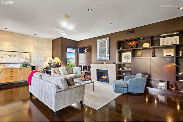 living room with dark hardwood / wood-style floors