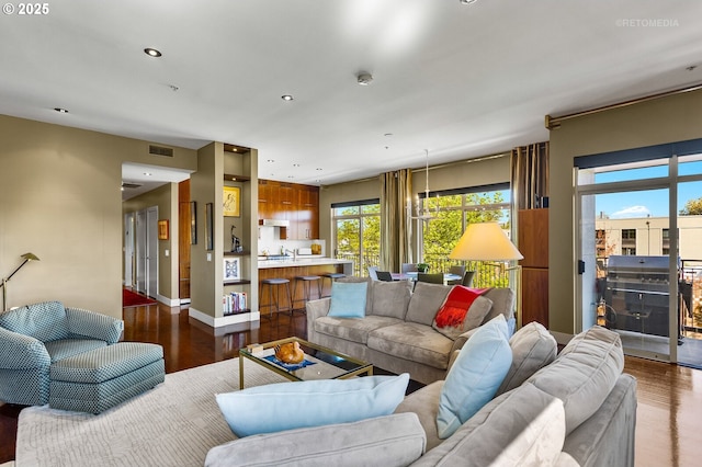 living room with dark wood-type flooring