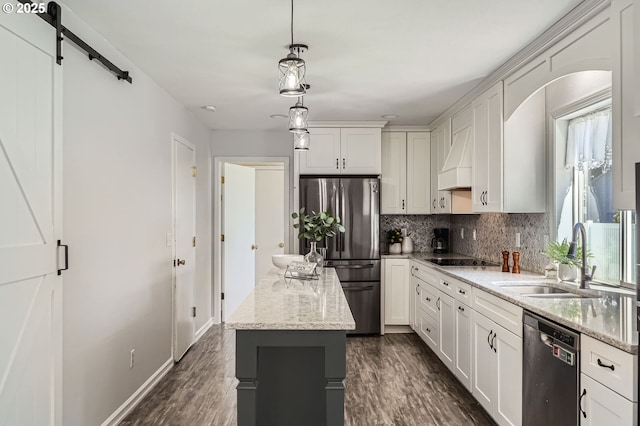 7217 NE 130th Ave, Vancouver, WA 98682 - kitchen with stainless steel appliances, a sink, tasteful backsplash, and dark wood-style flooring