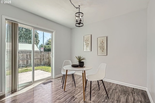 7217 NE 130th Ave, Vancouver, WA 98682 - dining space featuring baseboards, a chandelier, and dark wood-style floors