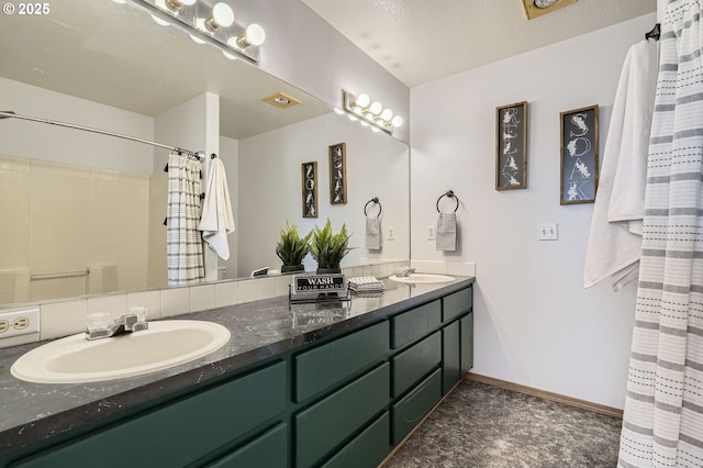 7217 NE 130th Ave, Vancouver, WA 98682 - full bath with double vanity, baseboards, and a shower with shower curtain