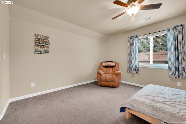 carpeted bedroom with lofted ceiling and ceiling fan