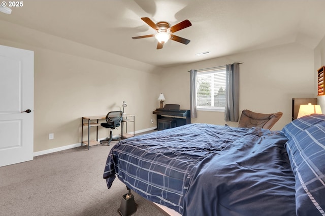 carpeted bedroom featuring ceiling fan and lofted ceiling