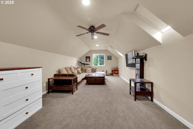 carpeted bedroom with ceiling fan and lofted ceiling