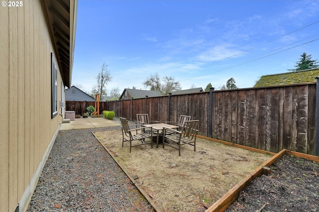 view of patio featuring a fire pit