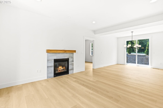 234 SE 29th St, Gresham, OR 97080 - unfurnished living room featuring light wood-style floors, a tiled fireplace, and recessed lighting