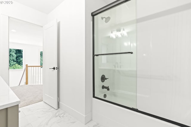 234 SE 29th St, Gresham, OR 97080 - bathroom featuring marble look tiles, shower / bath combination with glass door, and vanity