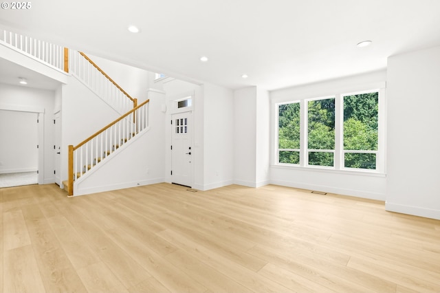 234 SE 29th St, Gresham, OR 97080 - unfurnished living room with stairway, light wood-style floors, and recessed lighting