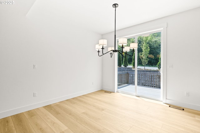 234 SE 29th St, Gresham, OR 97080 - unfurnished dining area featuring a chandelier and wood finished floors