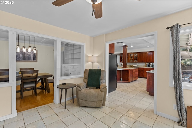 415 W Madrone St, Roseburg, OR 97470 - living area featuring ceiling fan, ornate columns, light tile patterned floors, and recessed lighting