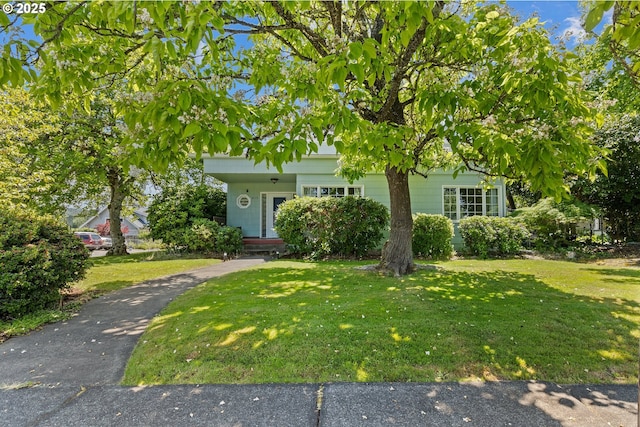 415 W Madrone St, Roseburg, OR 97470 - view of property hidden behind natural elements featuring a front lawn