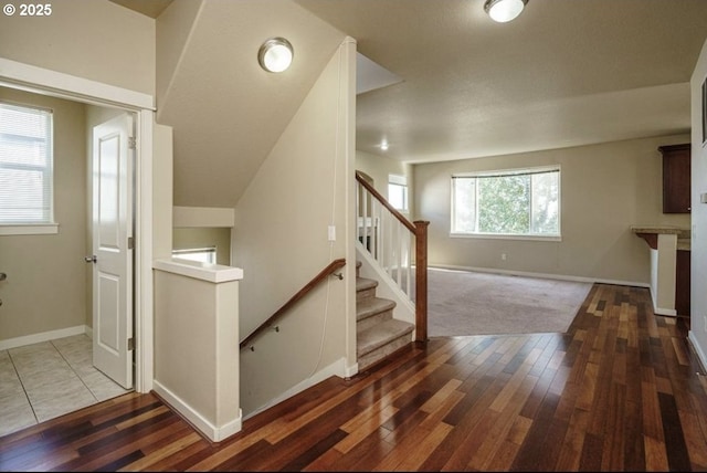 stairway with wood-type flooring