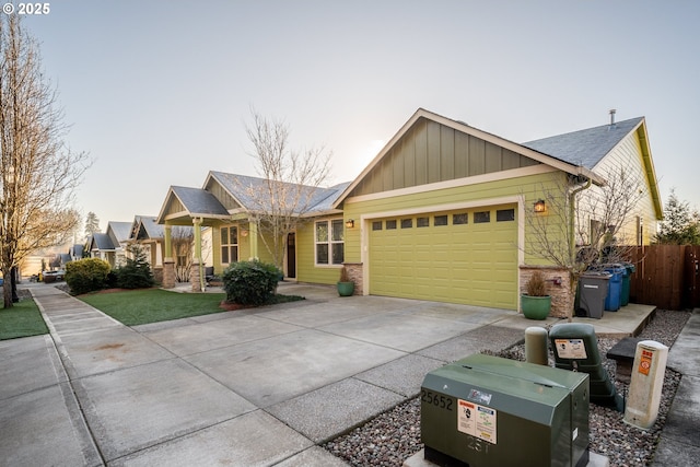 craftsman house with a garage