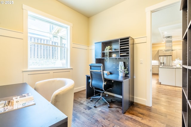 office with wood-type flooring