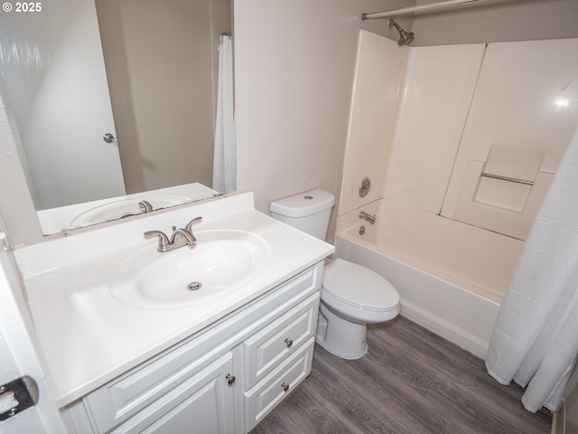 7450 N Portsmouth Ave, Portland, OR 97203 - full bath featuring shower / tub combo with curtain, wood finished floors, toilet, and vanity