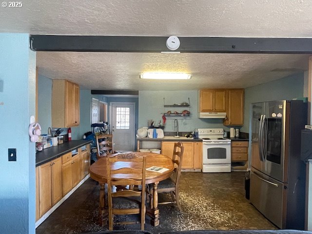 kitchen with white electric range oven, a textured ceiling, under cabinet range hood, smart refrigerator, and a sink