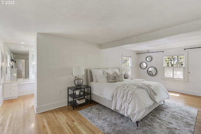 1805 SW Elizabeth St, Portland, OR 97201 - bedroom with light wood-style flooring and baseboards