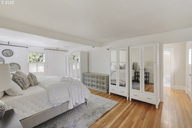 1805 SW Elizabeth St, Portland, OR 97201 - bedroom featuring light wood-style flooring and french doors