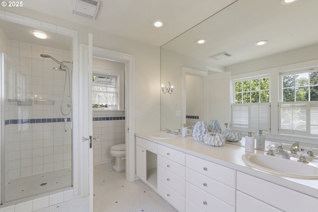 1805 SW Elizabeth St, Portland, OR 97201 - full bath with toilet, a stall shower, recessed lighting, double vanity, and tile patterned floors