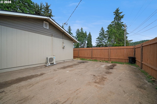 exterior space featuring ac unit, a patio area, and a fenced backyard