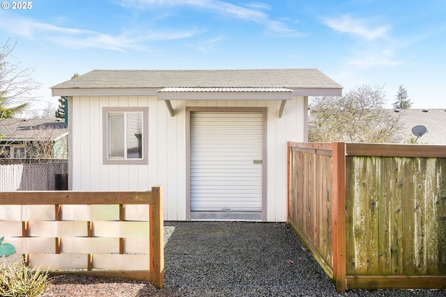 exterior space with fence and a tiled roof