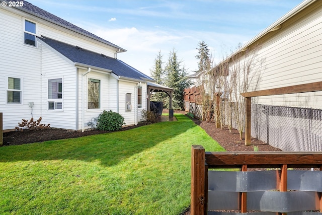 view of yard featuring fence