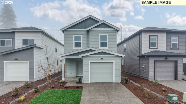 traditional home featuring a garage, board and batten siding, and concrete driveway